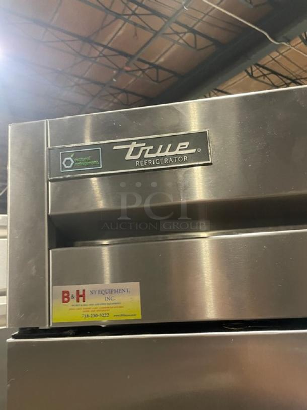 True Commercial Stainless Steel 2 Door Reach-In Refrigerator, Model T35HC. Includes wired rack, 115V 1 Phase, on casters.