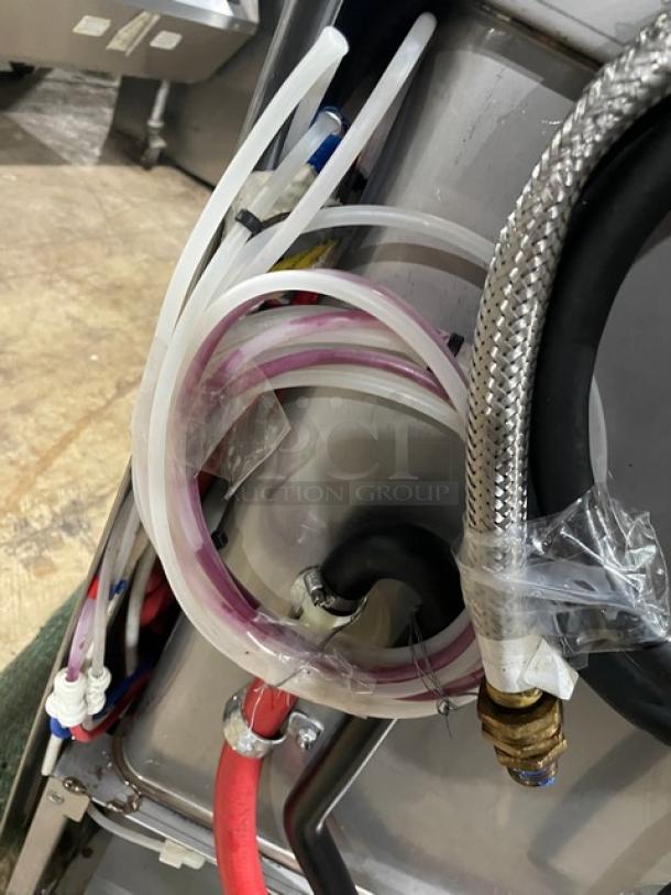 Hobart LXEC Advansys stainless steel dishwasher, electric, undercounter, low temp, with peg rack; hoses and wiring visible.