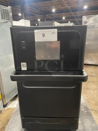 MerryChef commercial black electric rapid cook oven, countertop model, touchscreen interface, excellent condition.