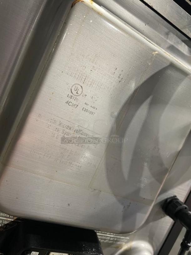 MerryChef black high-speed countertop oven, electric powered, showing controls and UL certification label.