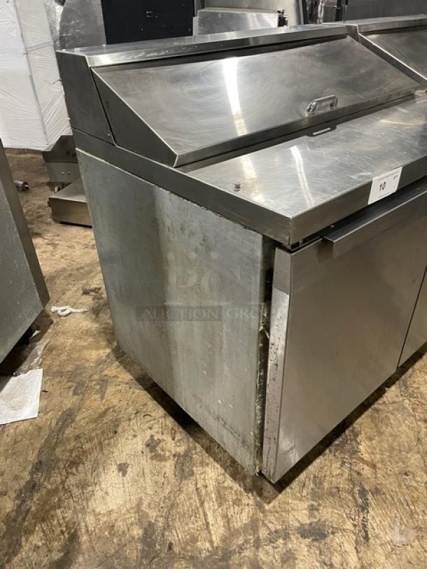 Continental SW72-18 stainless steel 3-door refrigerated prep table, bain marie style, on casters, used condition.