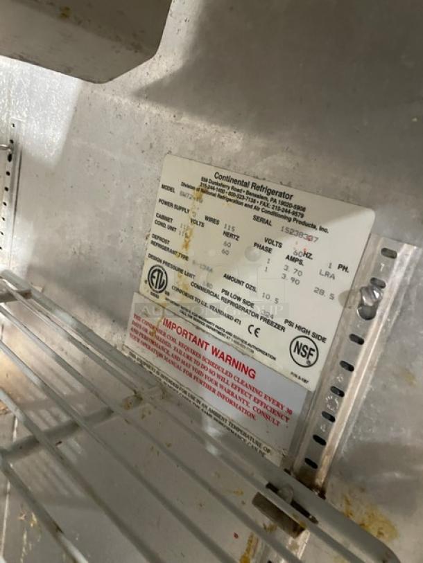 Continental SW72-18 stainless steel refrigerated prep table with poly coated rack. Model, serial, and specs label visible.