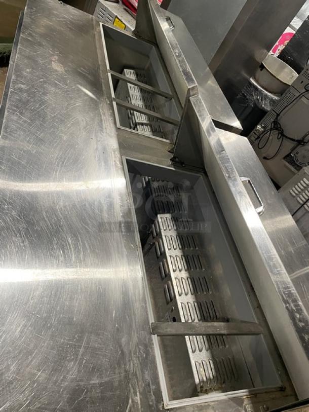 Continental SW72-18 refrigerated 3-door prep table, stainless steel, Bain Marie style, poly coated rack, on casters, 115V.