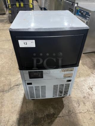Coldline ICE120HA stainless steel undercounter ice maker, 2020 model, on legs, visible control panel, appears in working condition.