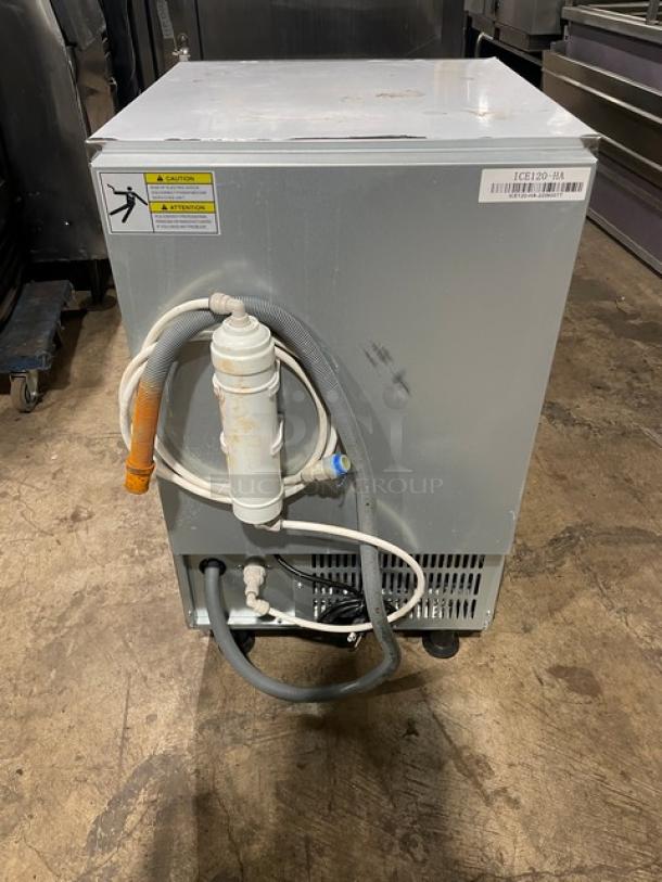 Late model 2020 Coldline ICE120HA stainless steel undercounter ice maker on legs. Working condition noted.