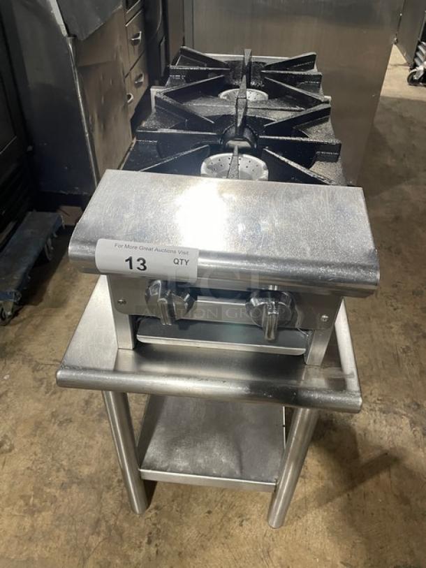 American Range commercial stainless steel gas-powered double stock pot range on stand, front-to-back design, dual burners.