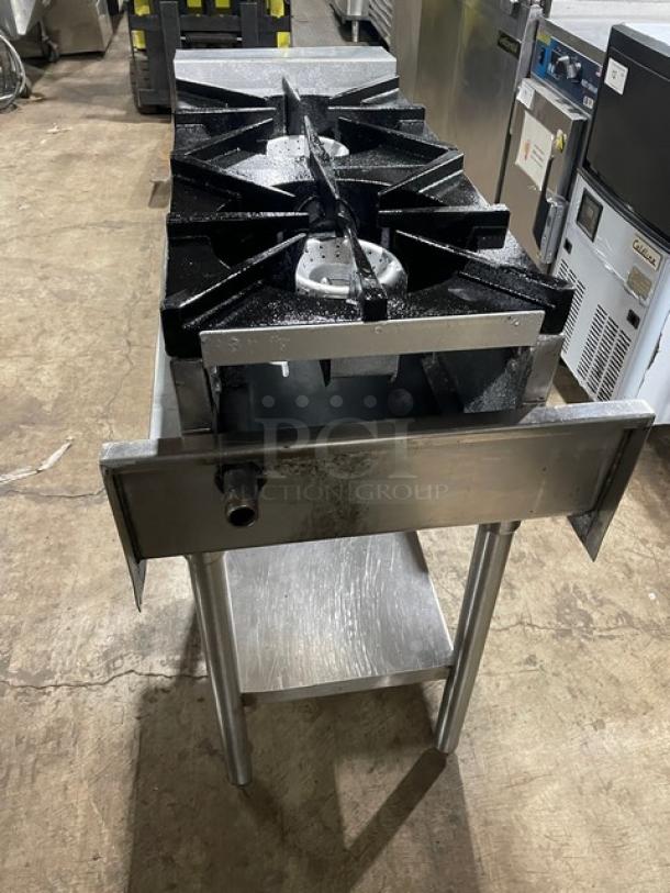 American Range stainless steel gas-powered double stock pot range with undershelf stand. Commercial-grade condition.