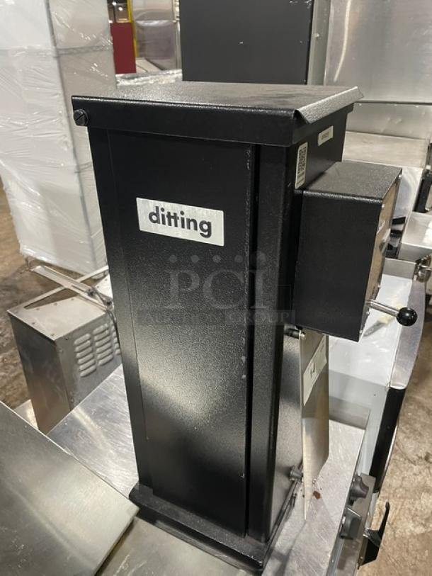 Ditting commercial black electric countertop coffee bean grinder in excellent condition, labeled with brand name.