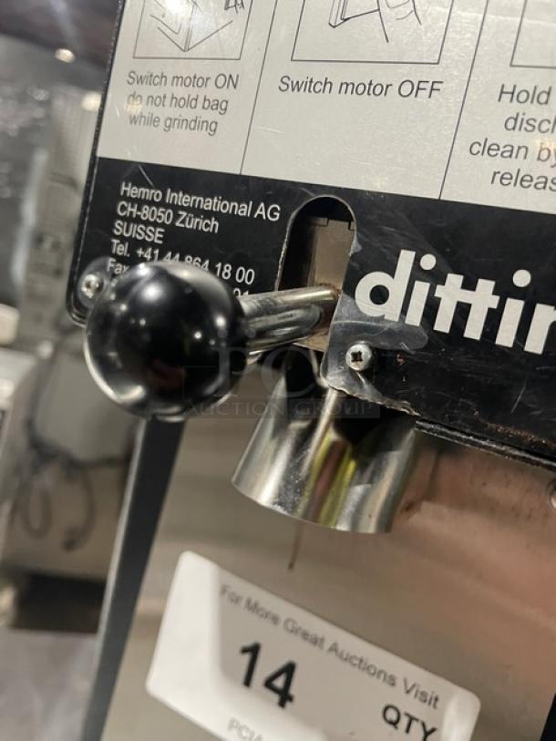 Ditting black electric coffee grinder, stainless steel parts, instructions visible; suitable for commercial use, good condition.