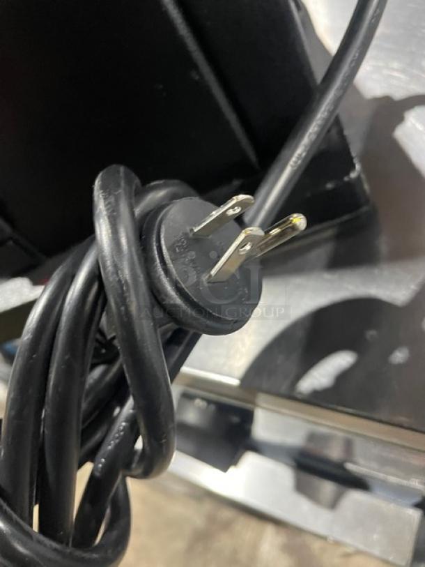 Ditting commercial black electric countertop coffee bean grinder, power cord detail, sturdy design, ideal for cafes.