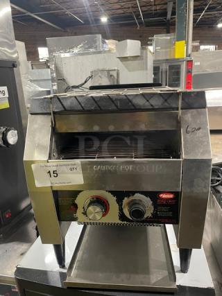Hatco Toast-Qwik TQ-20BA commercial conveyor toaster, stainless steel, electric, on legs, 208V, 1 phase, model label visible.