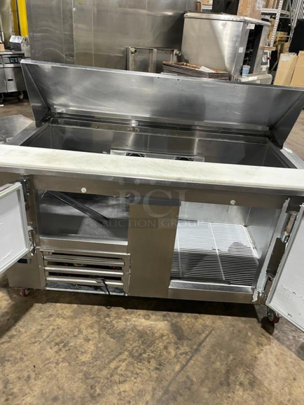 CoolTech Commercial Stainless Steel 2 Door Prep Table, Model CMPH-60BM, with poly-coated rack, on casters, in good condition.