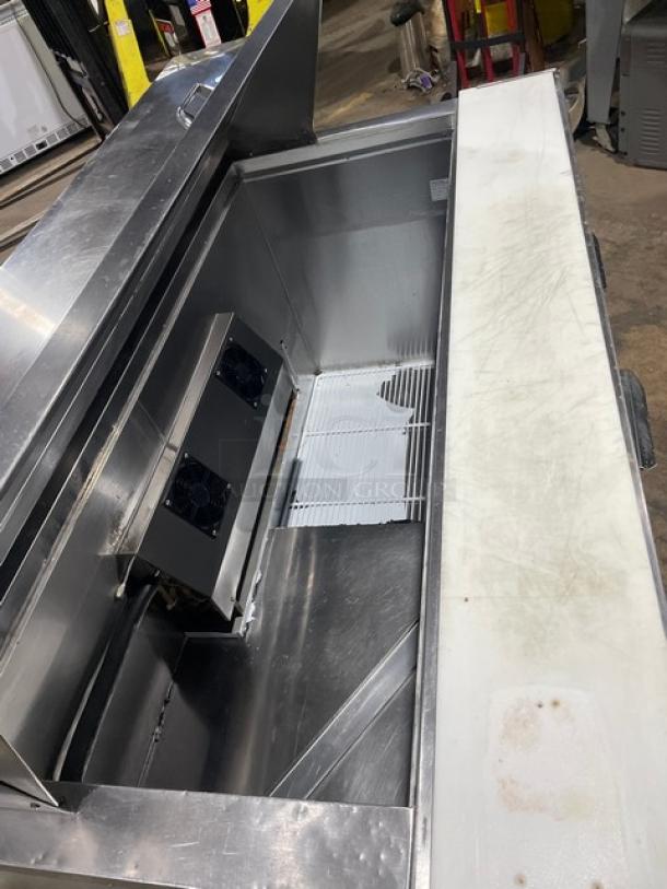 CoolTech CMPH60BM stainless steel 2-door refrigerated Bain Marie prep table with poly-coated wire rack, 120V, on casters.