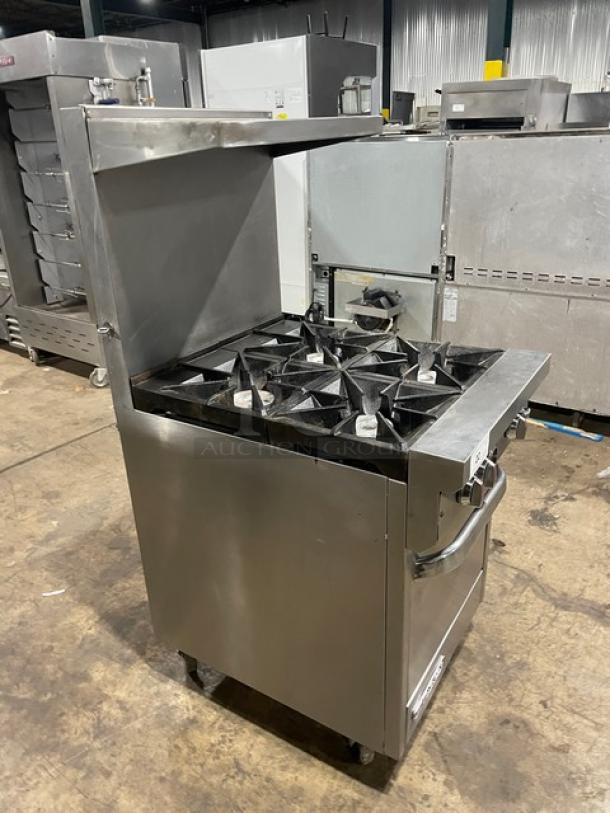 Southbend S241E stainless steel 4-burner range/oven combo with backsplash, salamander shelf, and wired oven rack. On casters.