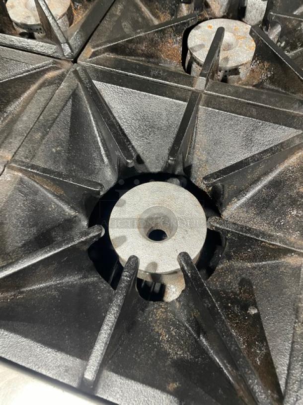 Southbend S241E stainless steel 4-burner range, natural gas, cast iron grates, used condition.