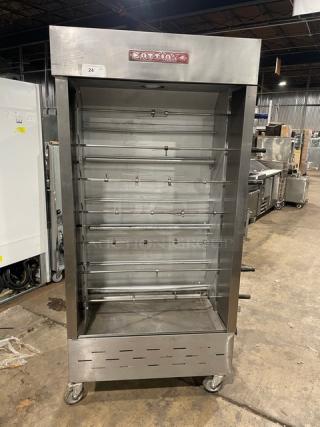 Attias commercial stainless steel gas rotisserie cabinet, full-height, free-standing, on casters, used condition.
