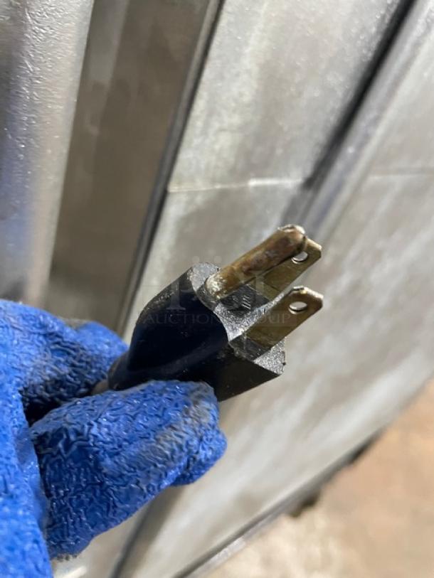 Attias commercial stainless steel rotisserie cabinet with gas power, full-height, on casters, plug detail shown.