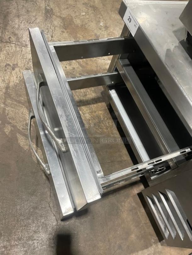 Beverage-Air stainless steel 2-drawer refrigerated chef base, model WTRCS361003, on casters, open drawer view.