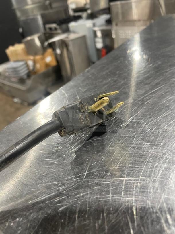 Alt text: Beverage-Air WTRCS36-1-003 stainless steel 2-drawer refrigerated chef base, shown with power plug detail.