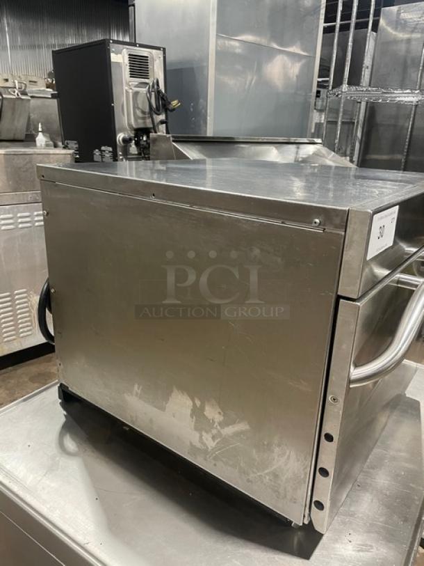 Menu Master MXP22TLT commercial stainless steel convection/microwave oven, 208/240V, on legs, visible wear.