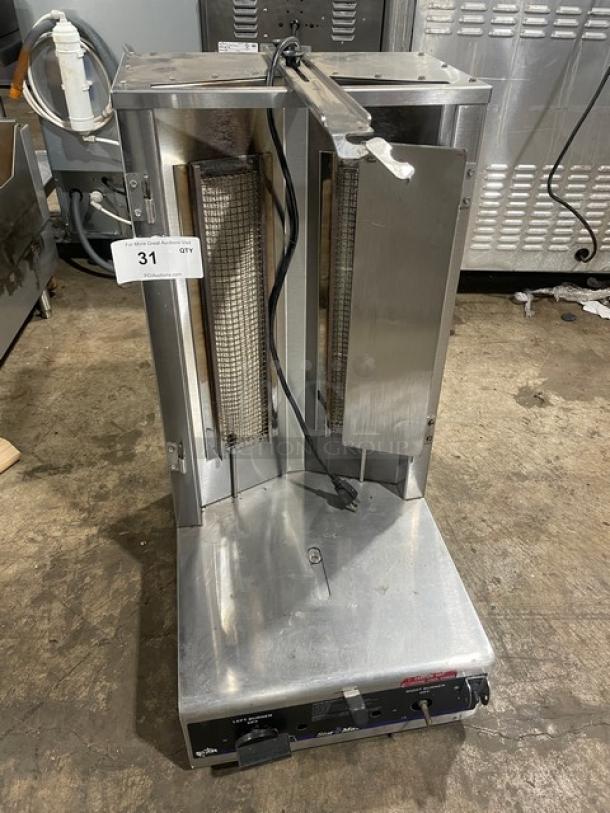 Star Max Series commercial stainless steel natural gas countertop vertical gyro broiler, 120V 1 Phase, on legs, with control panel.