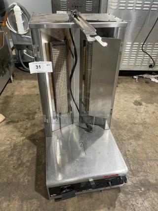 Star Max Series commercial stainless steel natural gas countertop vertical gyro broiler, 120V 1 Phase, on legs, with control panel.