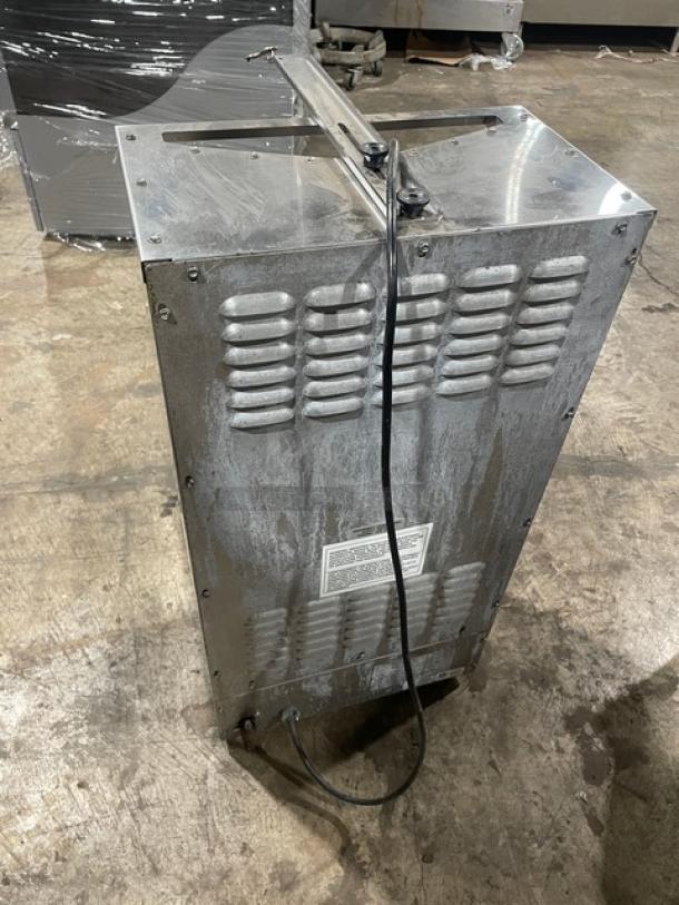 Star Max Series stainless steel vertical gyro broiler, natural gas powered, 120V 1-phase, on legs, commercial use.