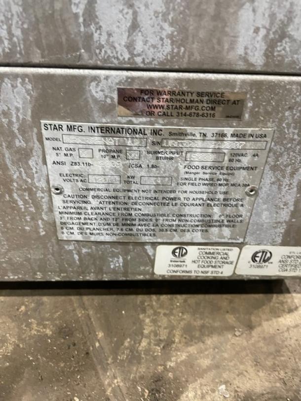 Star Max Series commercial stainless steel gyro broiler, natural gas powered, 120V, 1 Phase, countertop model, on legs.