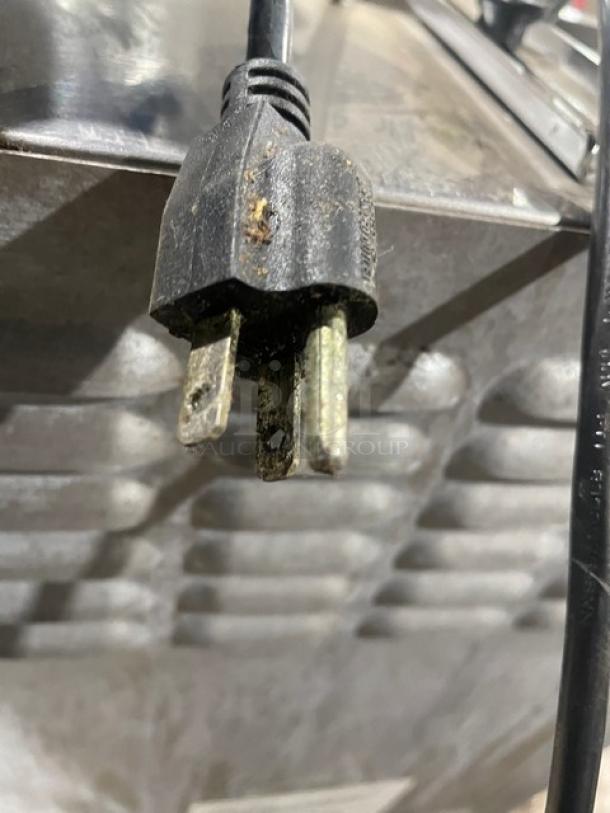 Star Max Series commercial stainless steel natural gas countertop vertical gyro broiler, 120V, 1 phase, on legs. Plug detail shown.