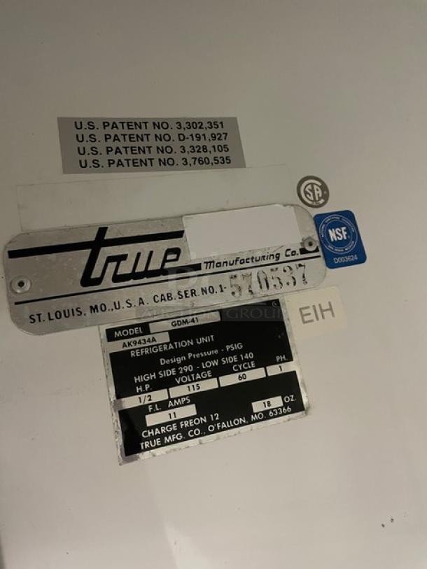 True Commercial Glass Sliding Door Refrigerator. Model GDM-41, SN: 570537, 115V 1 Phase. Features organizer, NSF certified.