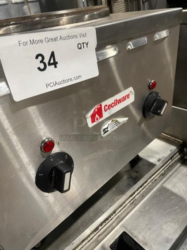 Cecilware commercial stainless steel electric hot plate, 2-burner range with control knobs and indicator lights, on legs, labeled.