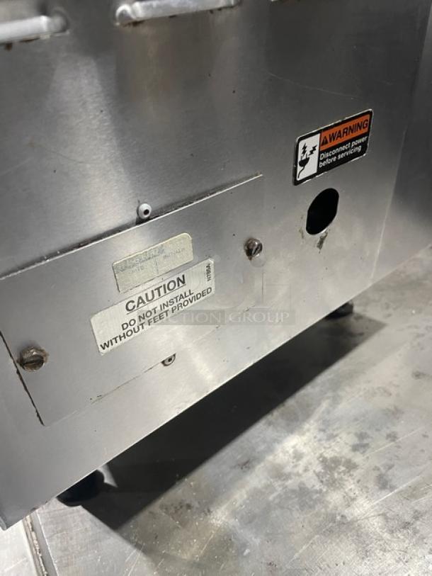Cecilware commercial stainless steel 2-burner electric hot plate on legs. Warning and caution labels visible.