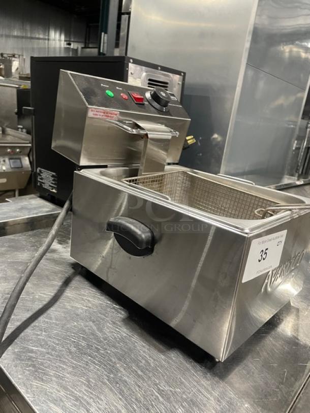 Avantco 177F100 stainless steel countertop deep fat fryer with backsplash and fry basket, 120V, in good condition.
