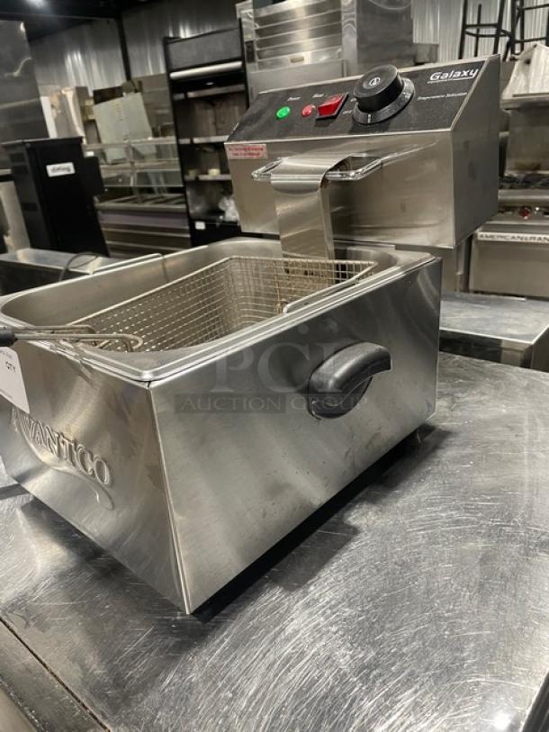 Avantco 177F100 Commercial Stainless Steel Deep Fryer with backsplash and fry basket, 120V, in good condition.