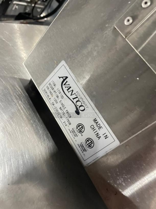 Avantco 177F100 commercial stainless steel countertop deep fat fryer with backsplash, fry basket, and visible product label.