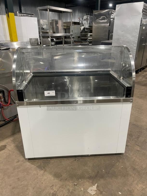 Commercial white curved glass 46" ice cream/frozen yogurt dipping cabinet with rear lift-open access. Serial No: N1902303.