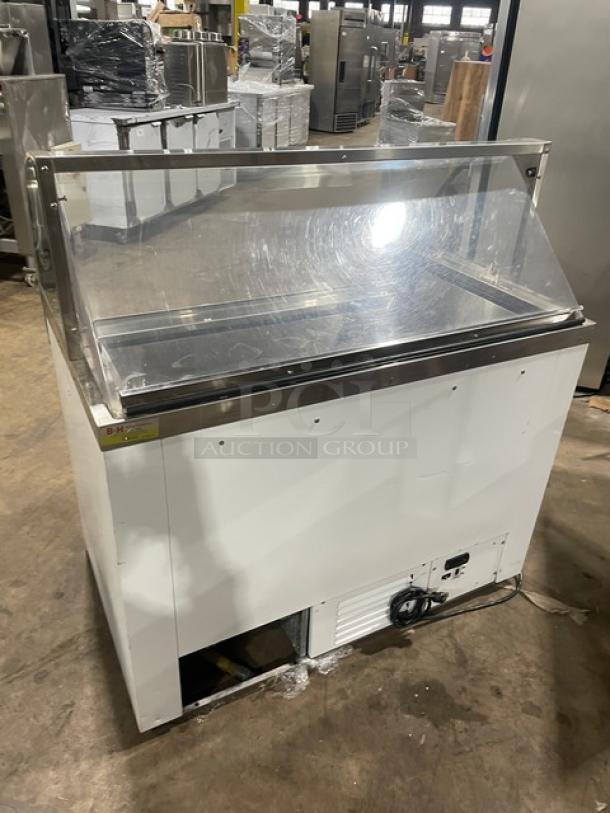 Commercial white 46" curved glass ice cream/frozen yogurt dipping cabinet with rear lift-open access, SN: N1902303, good condition.