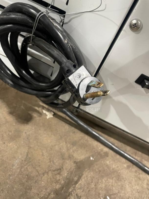 Commercial white ice cream dipping cabinet with curved glass, 46 inches wide, rear lift-open access. Serial No: N1902303.