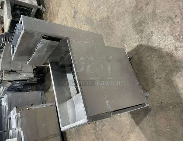 Trialator 40lb deep fat fryer, stainless steel, gas-powered, with backsplash and legs. Commercial use. Good condition.