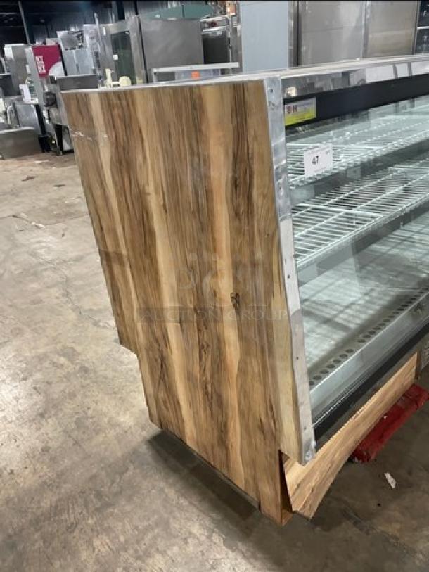Marc SQBCR-59 commercial 59" wooden flat glass bakery display case with poly coated wired rack and rear sliding glass doors.