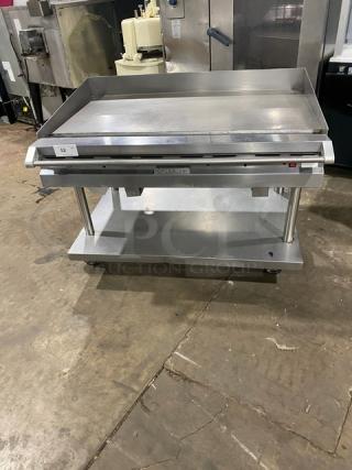 RARE Vulcan Checkers Style stainless steel countertop griddle with back/side splash, undershelf cart, on casters, 120V, natural gas.