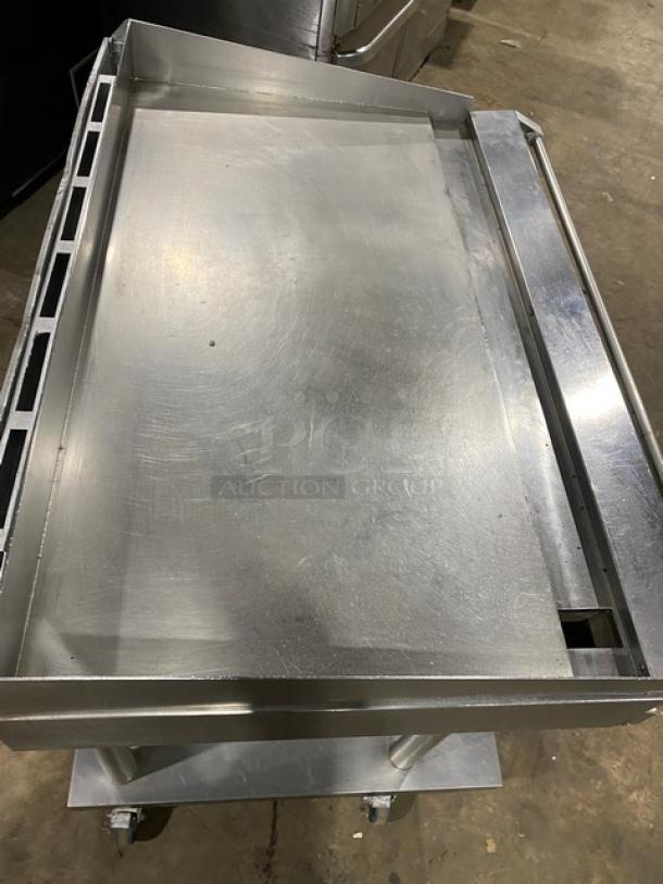 RARE Vulcan Checkers Style stainless steel gas countertop griddle with back/side splash, undershelf cart, and casters.