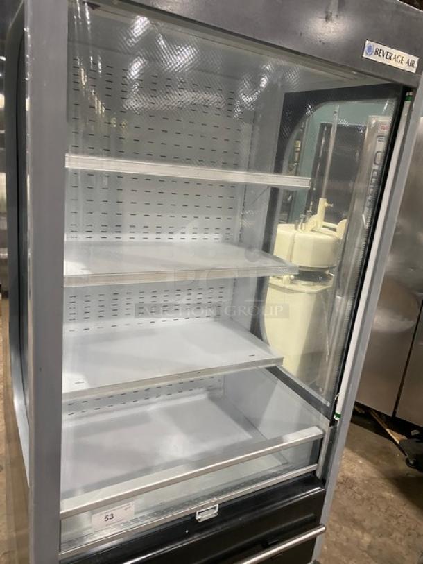 Beverage Air VM12 open air merchandiser display case with adjustable shelving. Model VM12, SN: 0426000-33154-0, 120V 1 Phase.