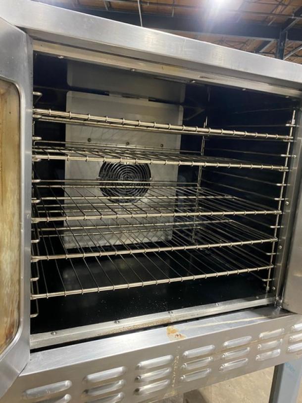 American Range stainless steel gas convection oven, single stack, with wired oven rack, on legs, commercial grade.