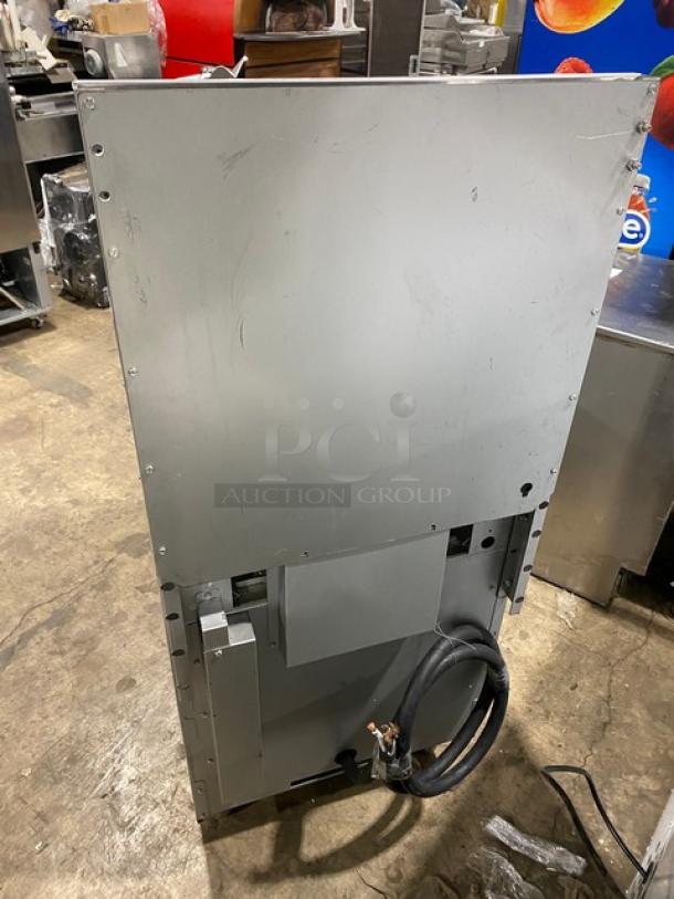 Cookline 2023 stainless steel 4-burner range/oven combo, model ER24-208, visible power cord, on legs, excellent condition.