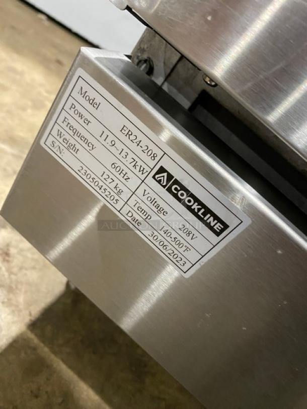 Cookline Model ER24208 commercial stainless steel electric 4-burner range/oven, serial 2305045205, with backsplash.