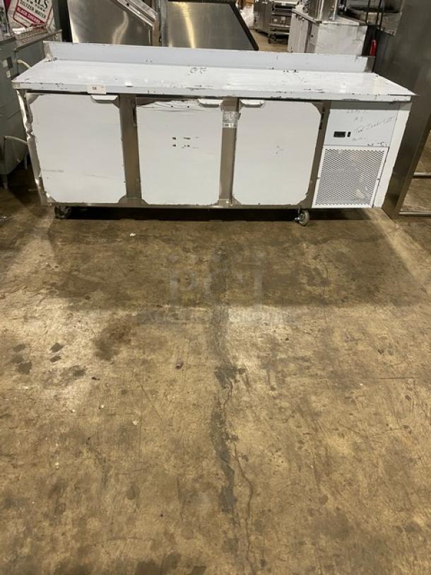 LIKE NEW Custom Cool stainless steel 3-door refrigerated 93" worktop table, model LB93SC, on casters, with pan rack.