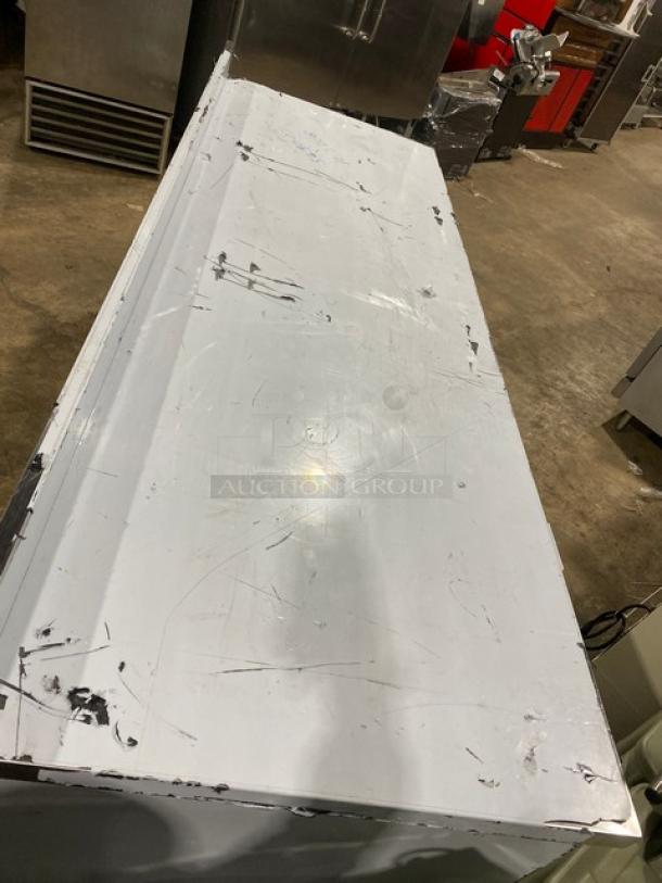 LIKE NEW Custom Cool 3 Door Refrigerated Worktop Table, Model LB93SC, 93", stainless steel, on casters, 115V 1 Phase.