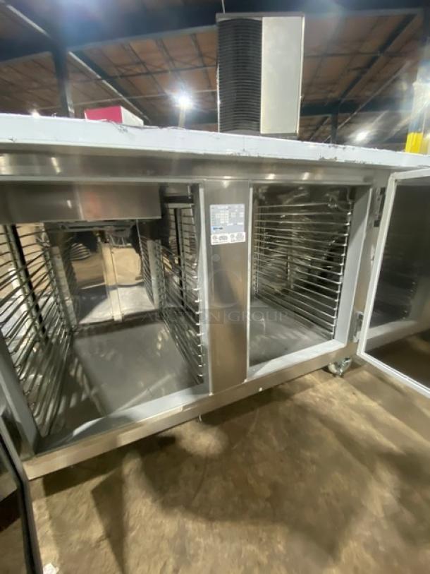 LIKE NEW Custom Cool LB93SC 93" 3-door refrigerated stainless steel worktop table with built-in pan rack, on casters.