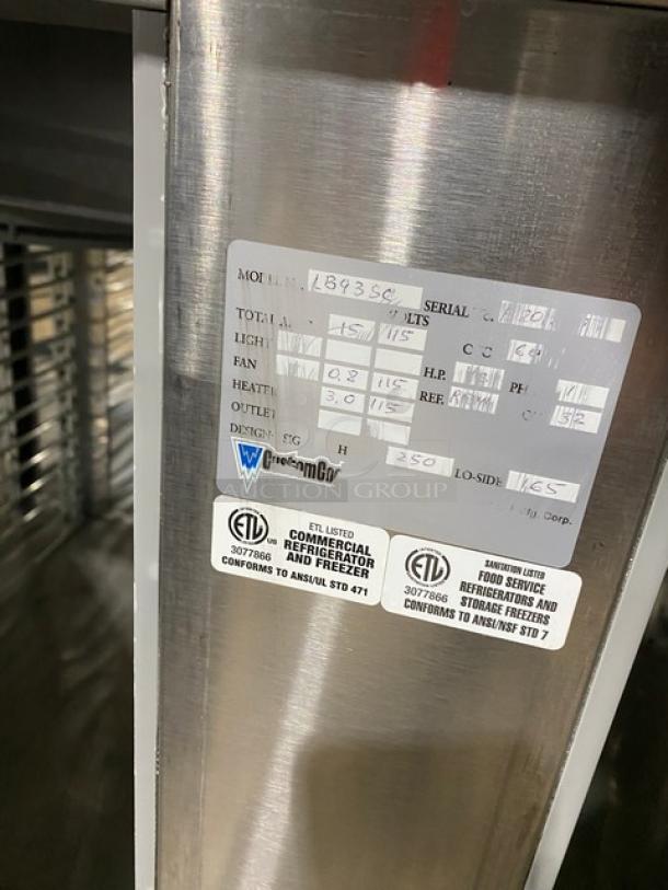 Custom Cool LB93SC stainless steel 3-door refrigerated worktop table, like new, features built-in pan rack, 93", on casters.